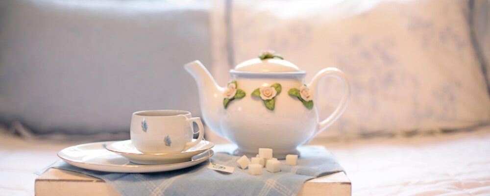 teapot on tray in bedroom